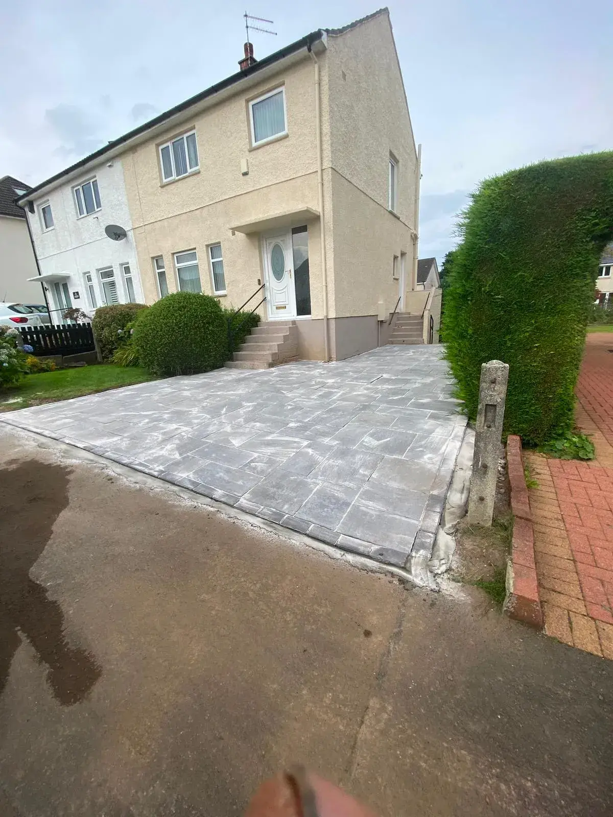 Finished driveway paving outside a Glasgow home
